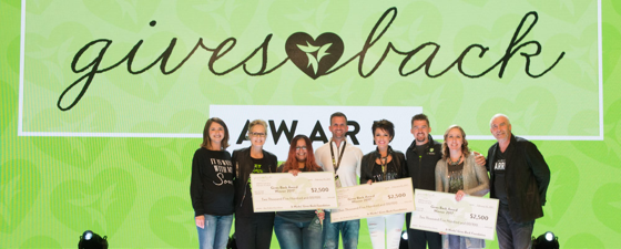 Gives Back Banner